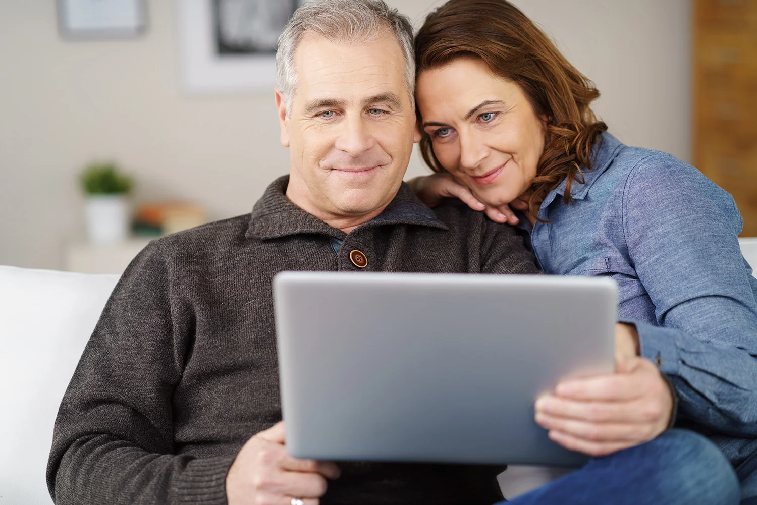 Couple attending an online estate planning workshop